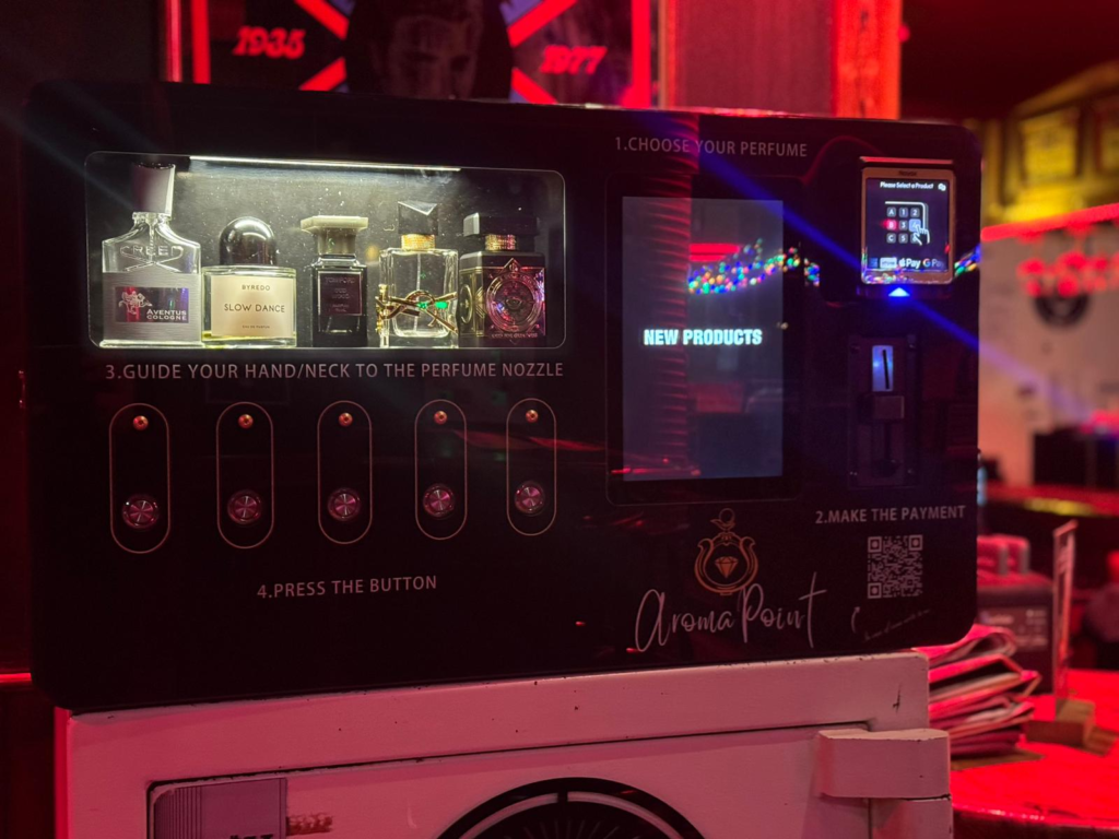 perfume vending machine cost